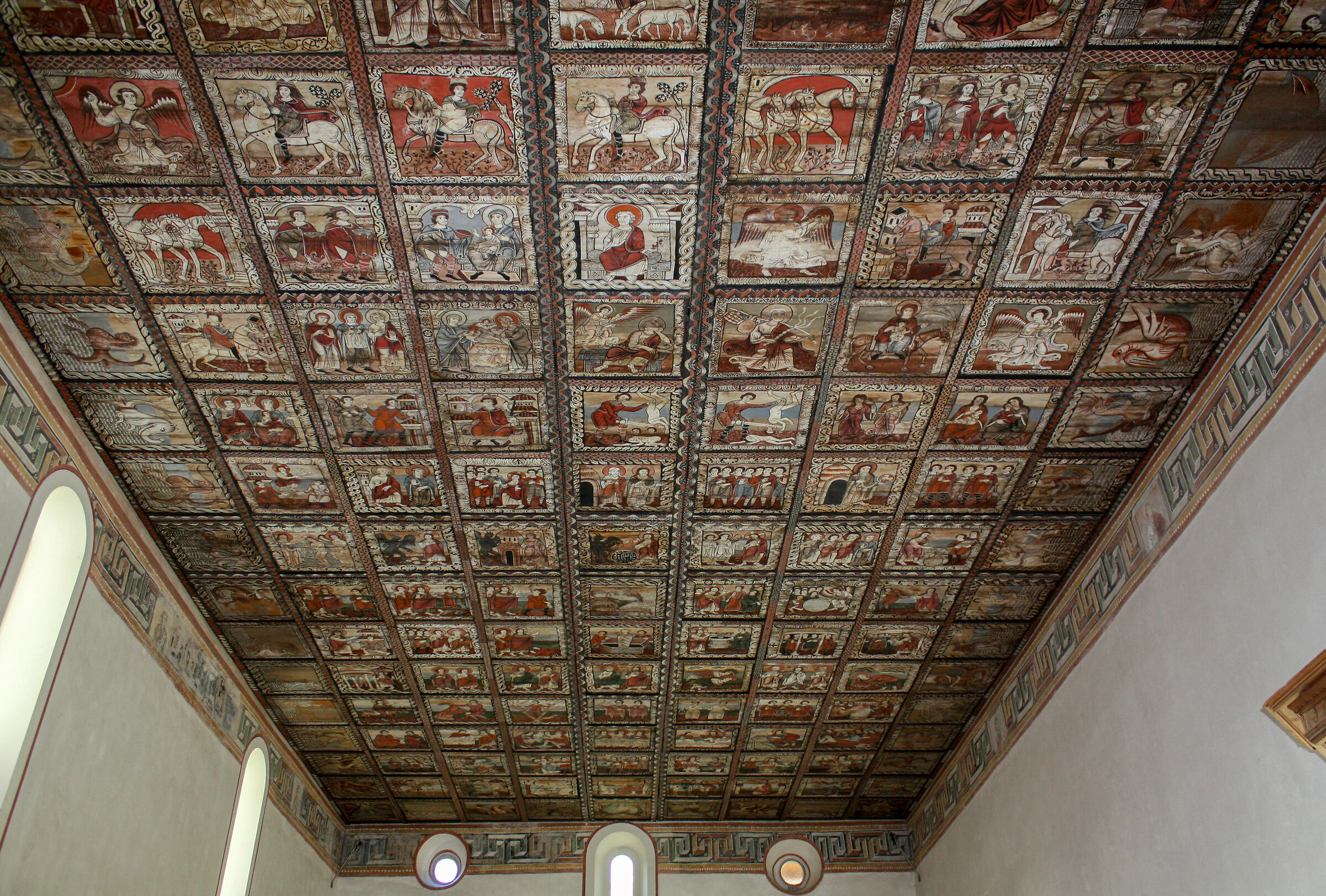 The painted ceiling of St. Martin in Zillis...