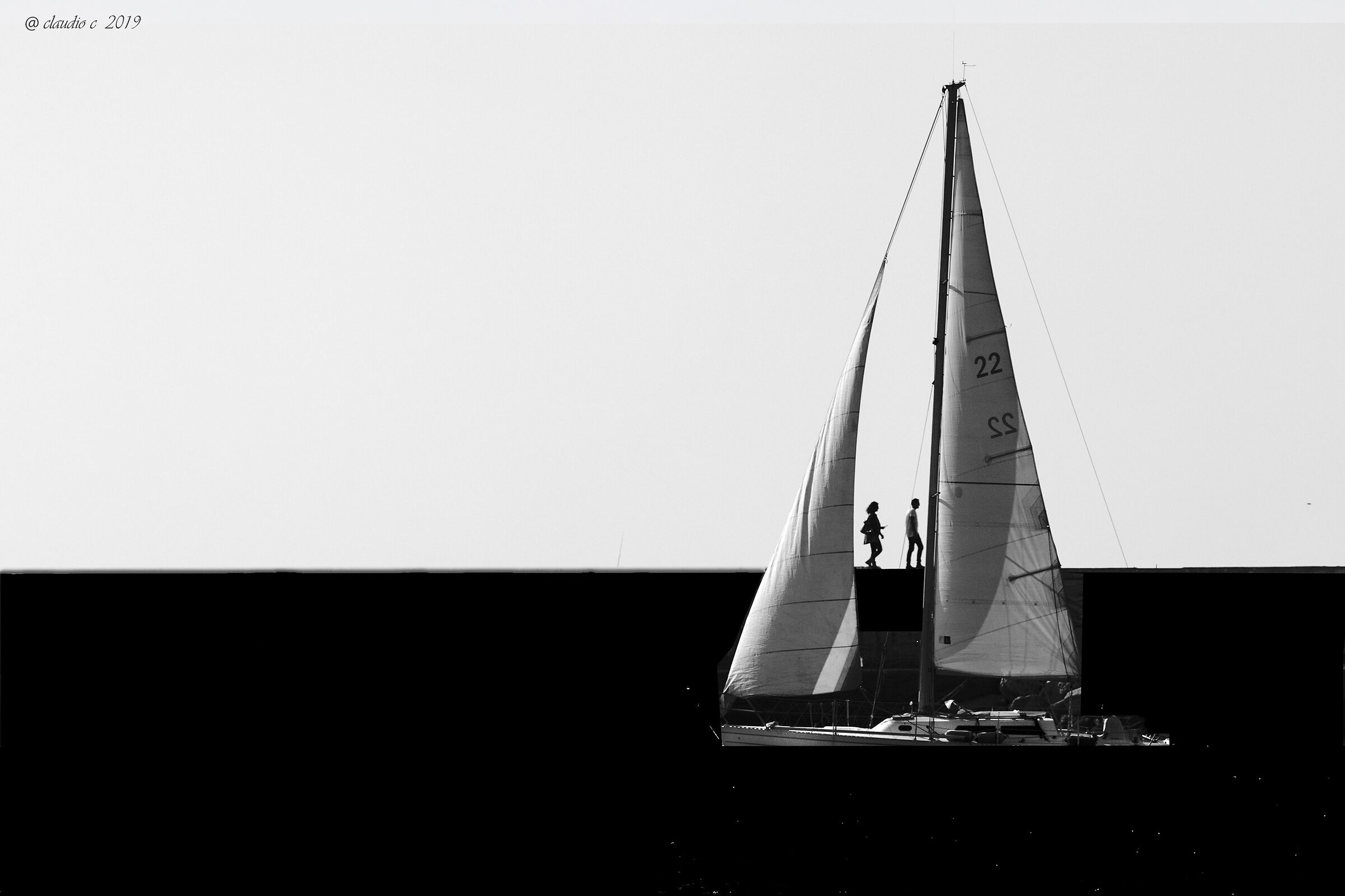 Between the sails...
