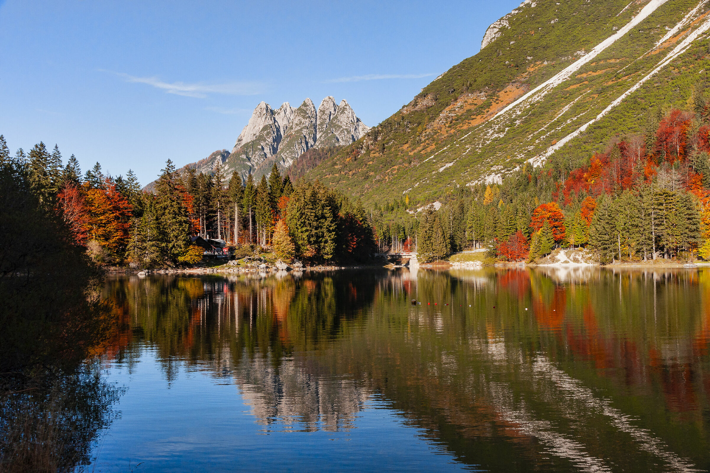Autumn at the lake of Predil Cave...