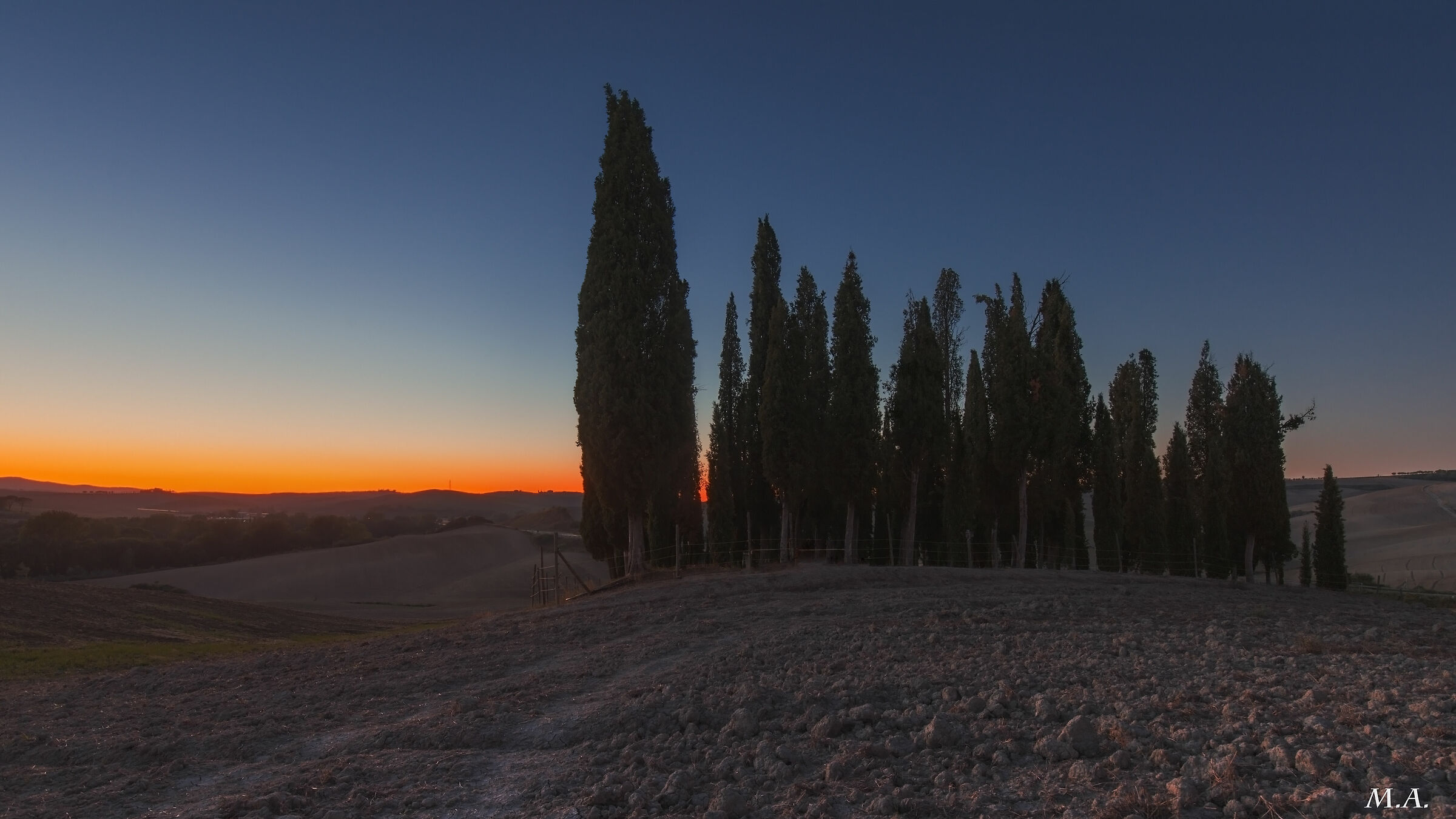 Val d'Orcia - Blue time on aridate cypresses...