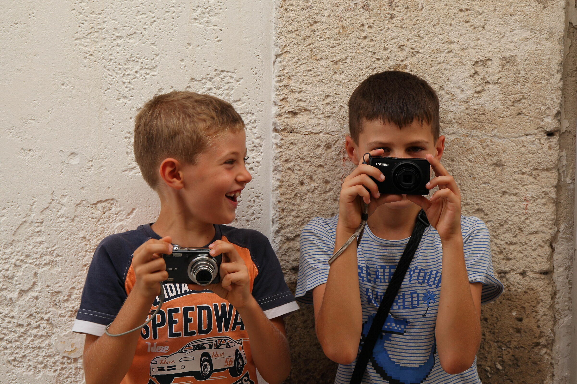 Budding photographers in Polignano...