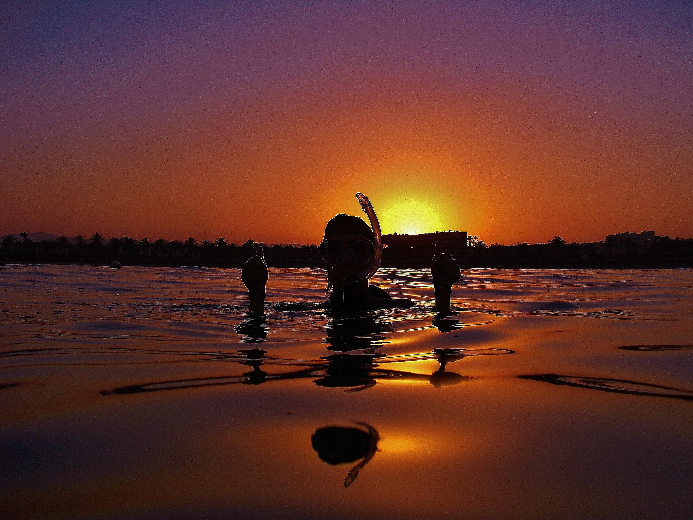 Snorkeling at sunset ...