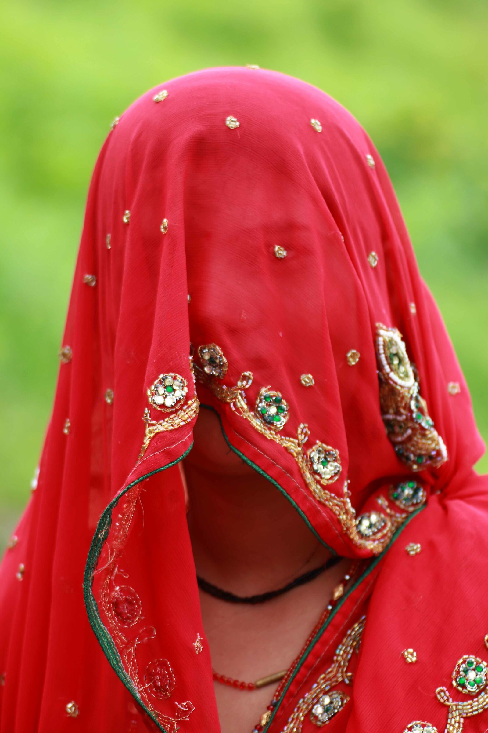 woman in red - india...