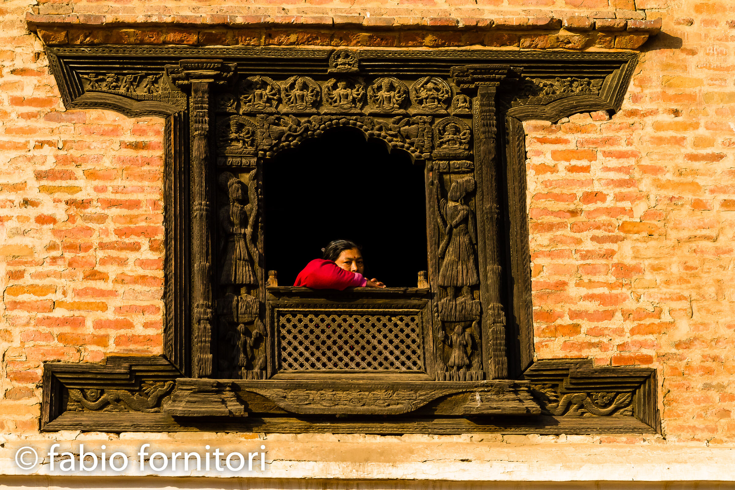 Bhaktapur, Woman in the window, Nepal 2011...