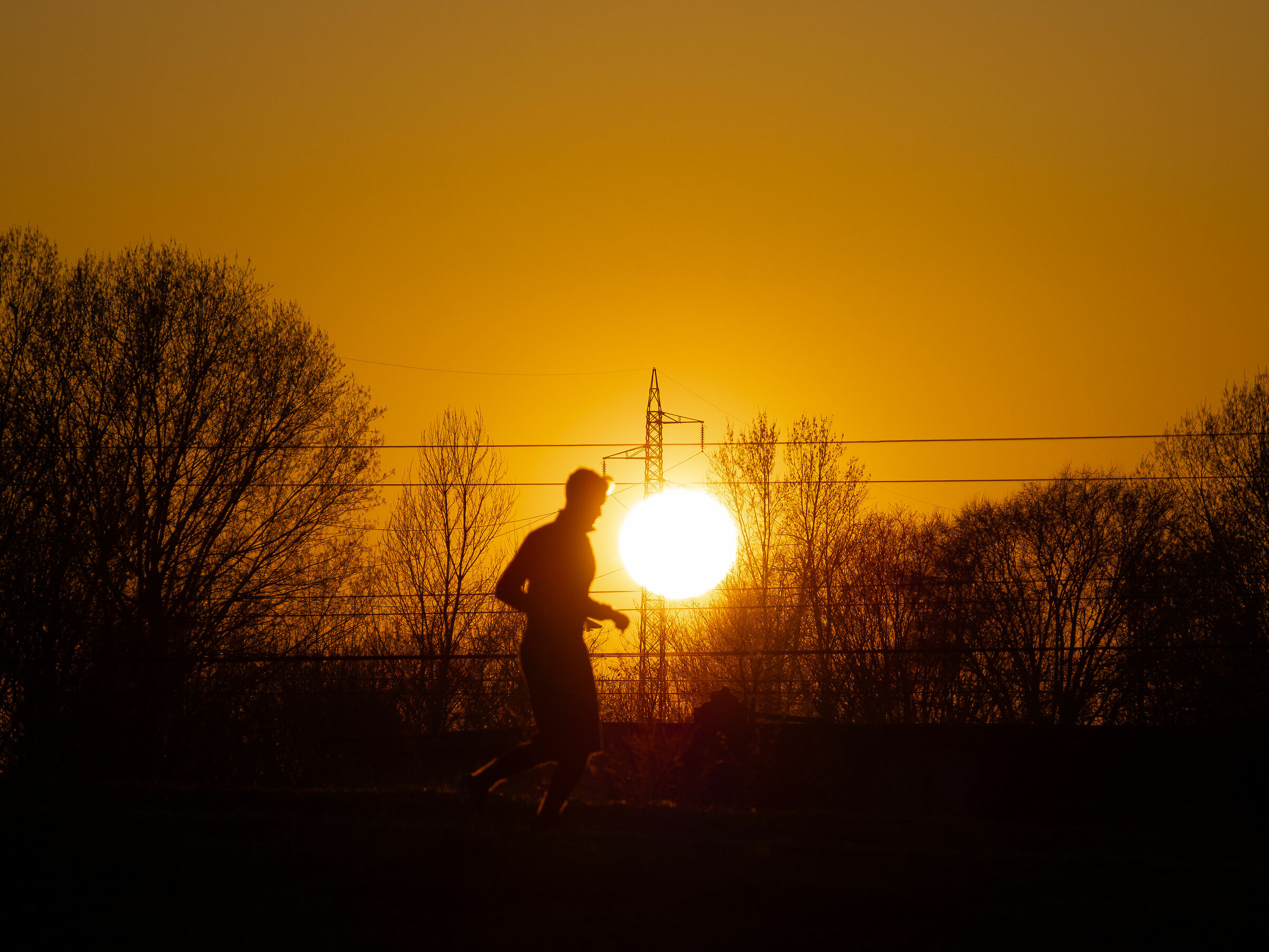 Runner in sunset...