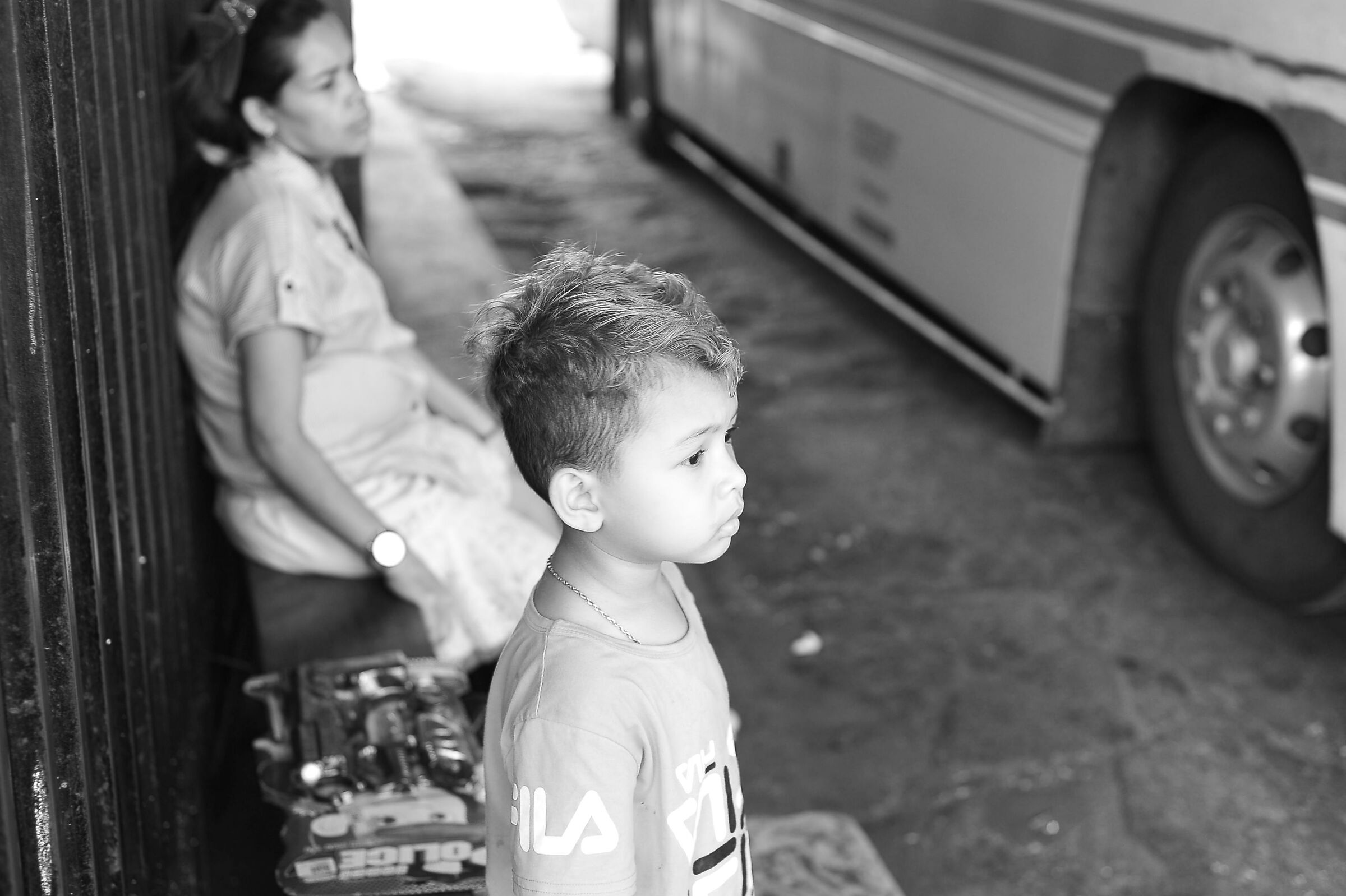 Boy waiting for bus...