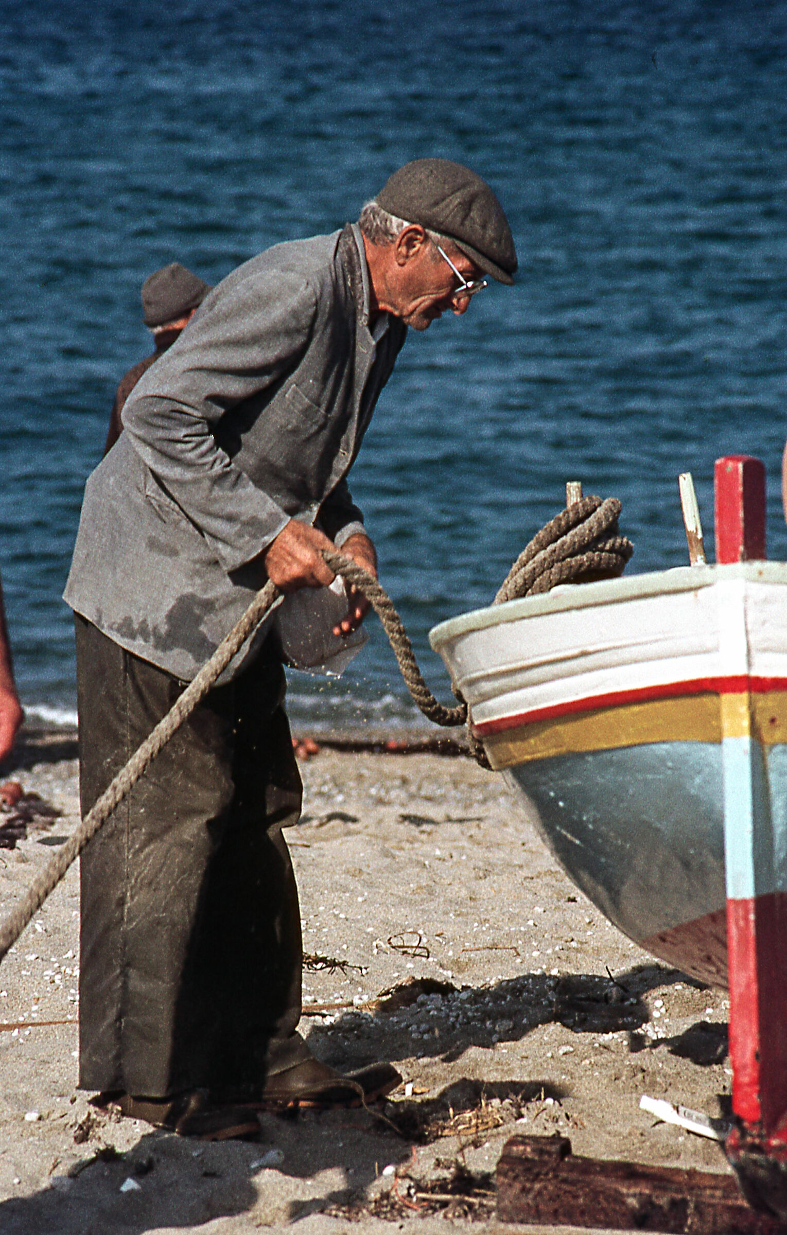 An elderly fisherman...