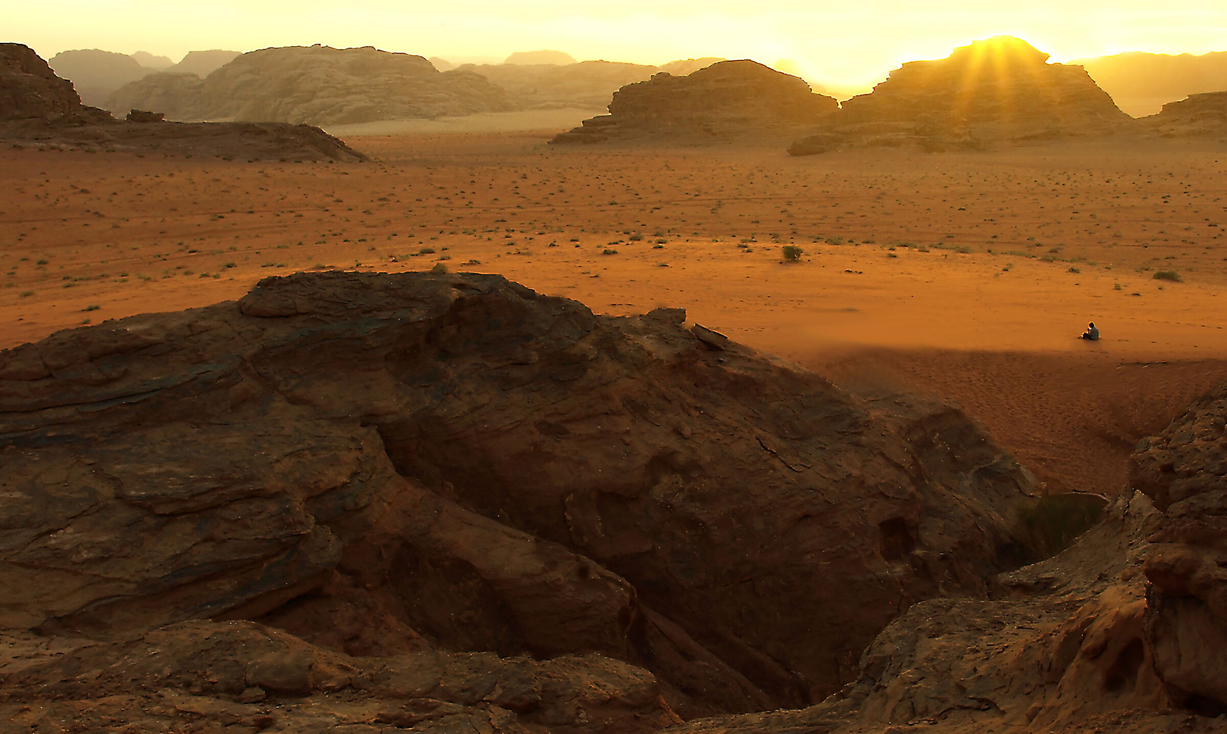 Man: A dot in the desert - Wadi rum - Jordan...