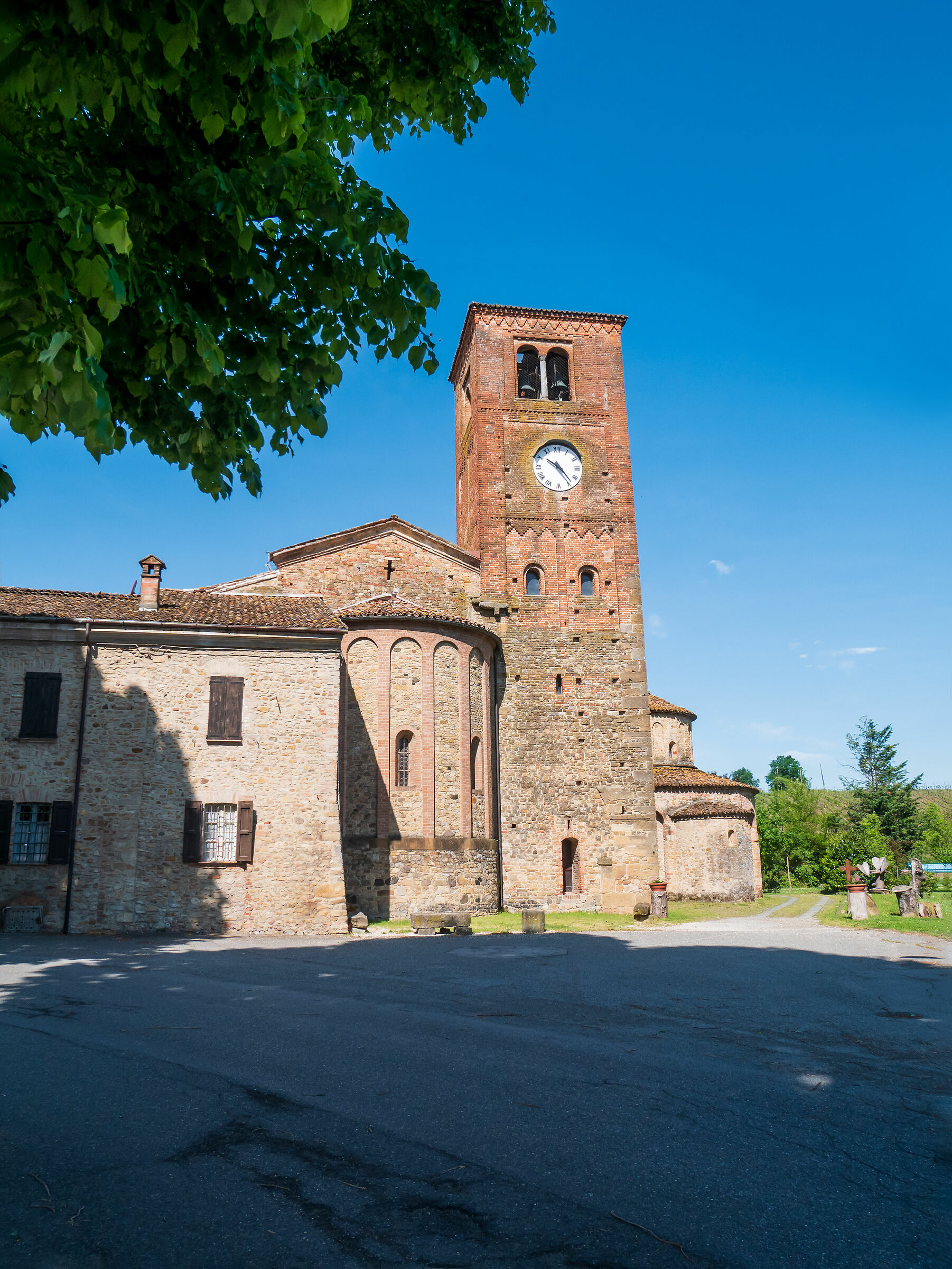 Romanesque church facade and baptistry - Vigolo Marquis...