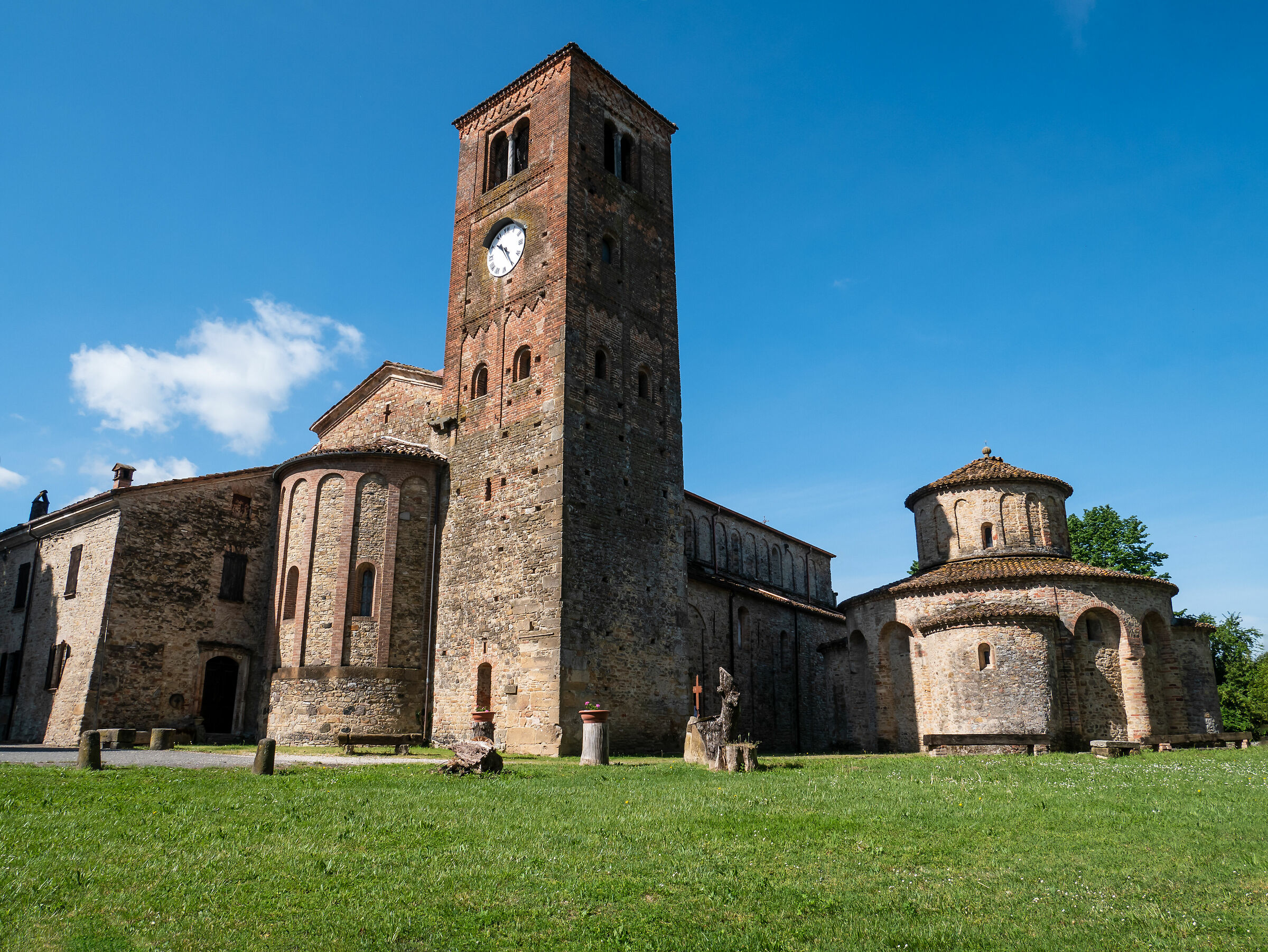 Romanesque church and baptistry side - Vigolo Marquis...