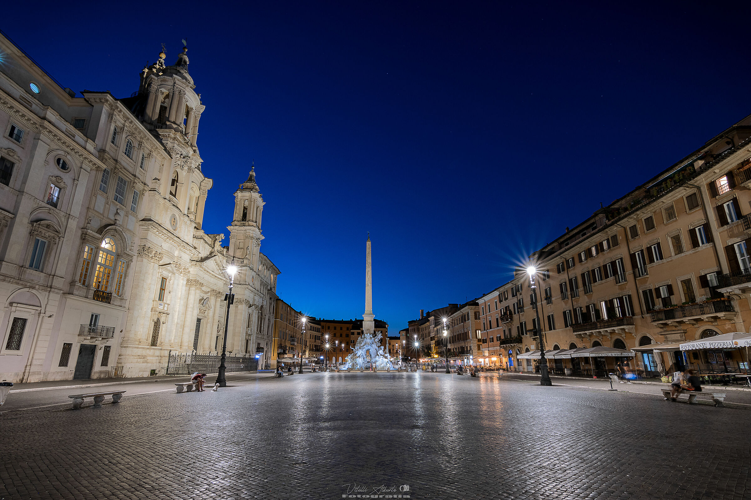 Now blue on Piazza Navona, the heart begins to pulsate again...