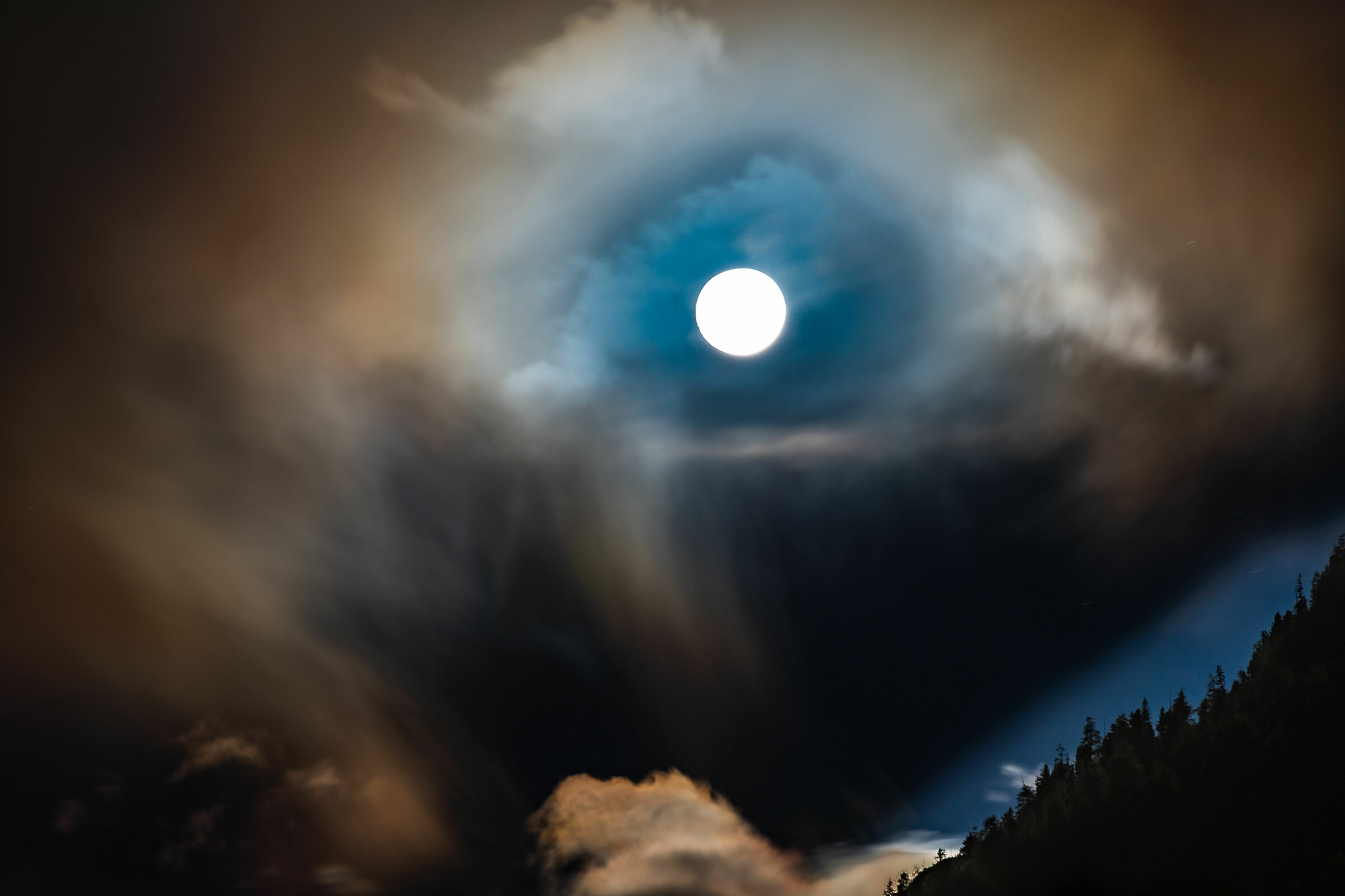 the moon in the clouds ...