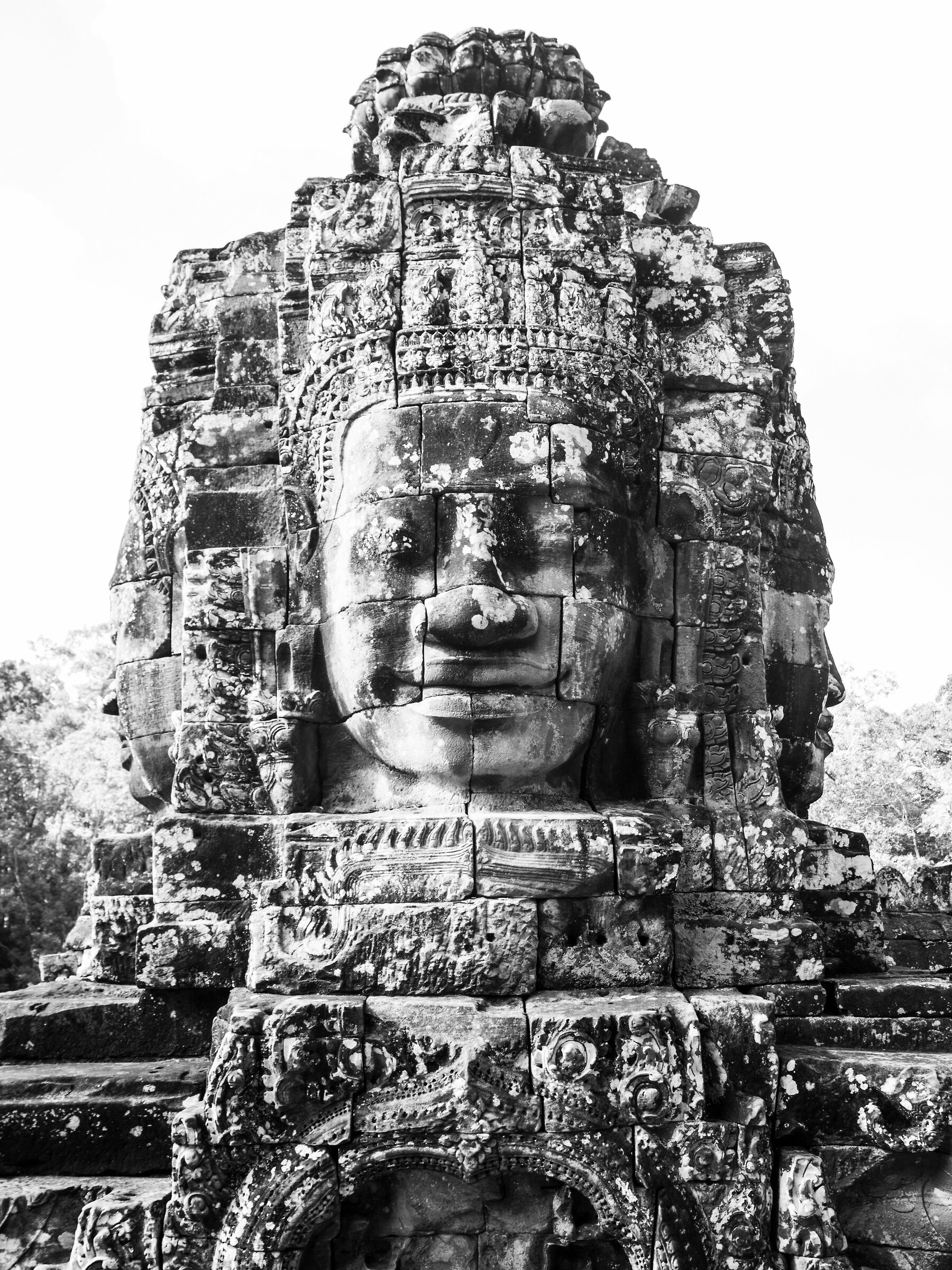 one of Lokesvara's 200 faces in Angkor Thom, Cambodia...