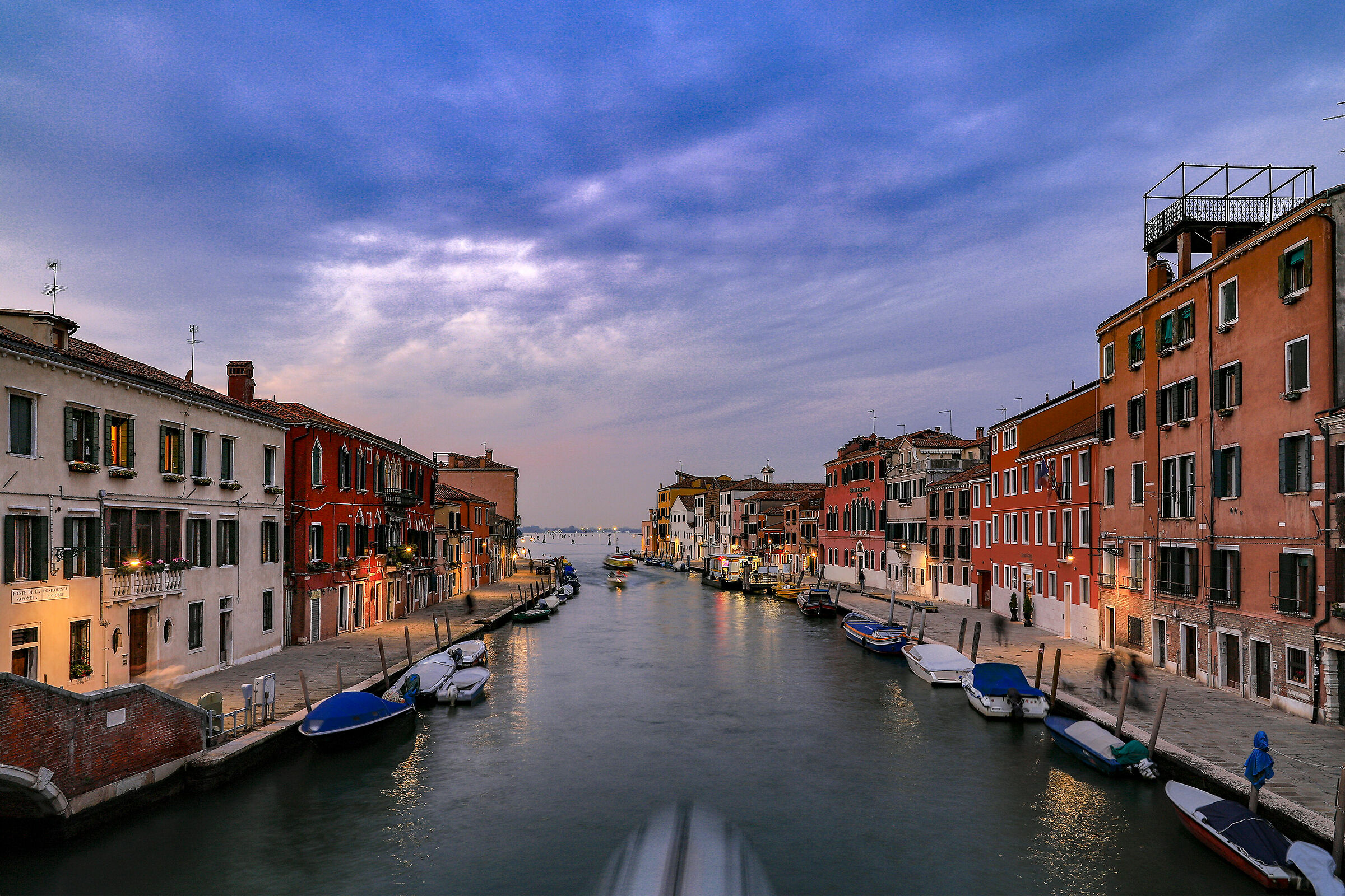 the first lights come on in Cannaregio...