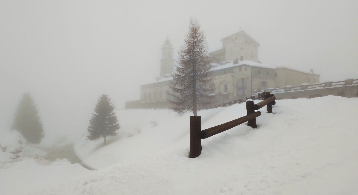 The Sanctuary of San Magno shrouded in fog...