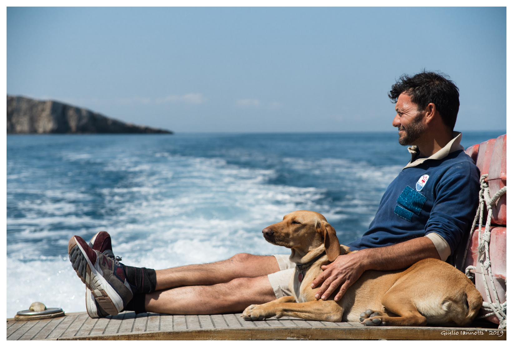 The man, his dog and their sea...