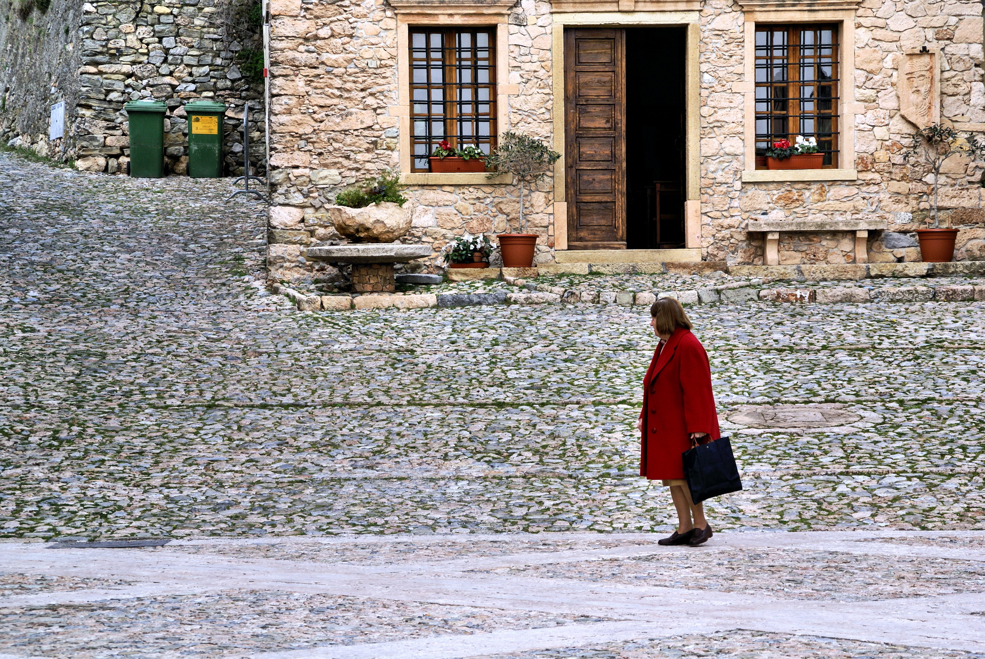 Woman walking in Borgio Verezzi...