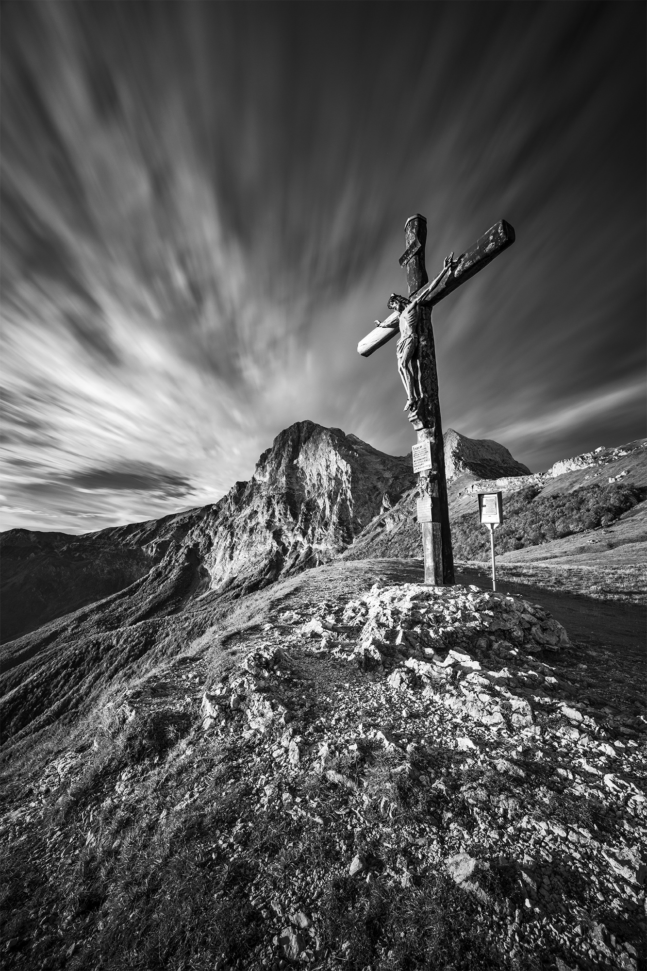 The great cross from the high top meadows of Tivo Gran Sasso...