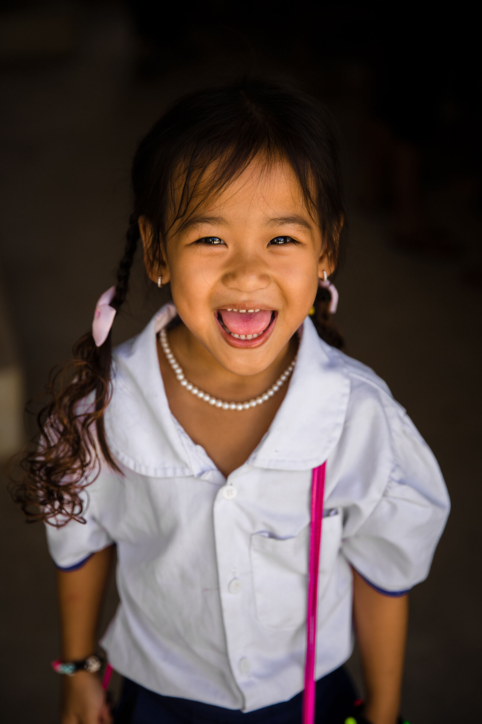 A smiling Cambodian girl...