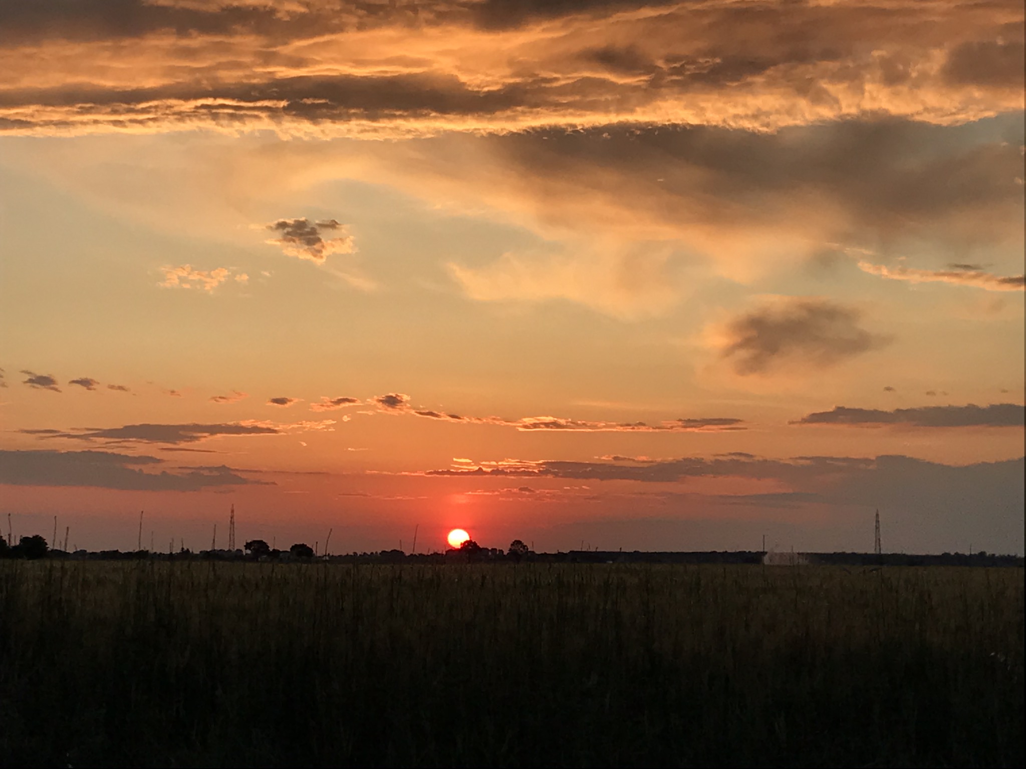 Sunset over fields of Emilia...