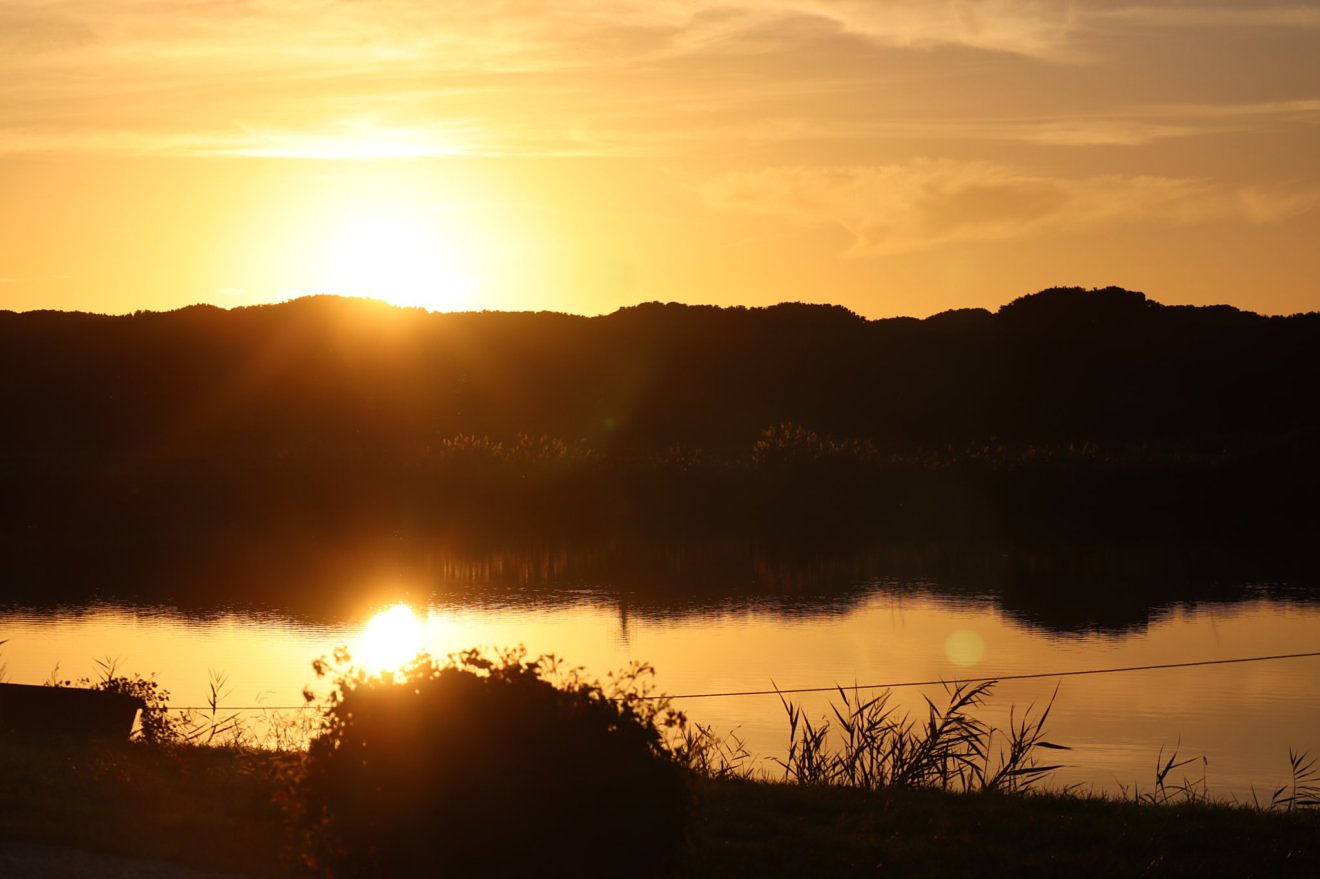 luce tramonto che cambia, lago delle Tamerici a Coltano...