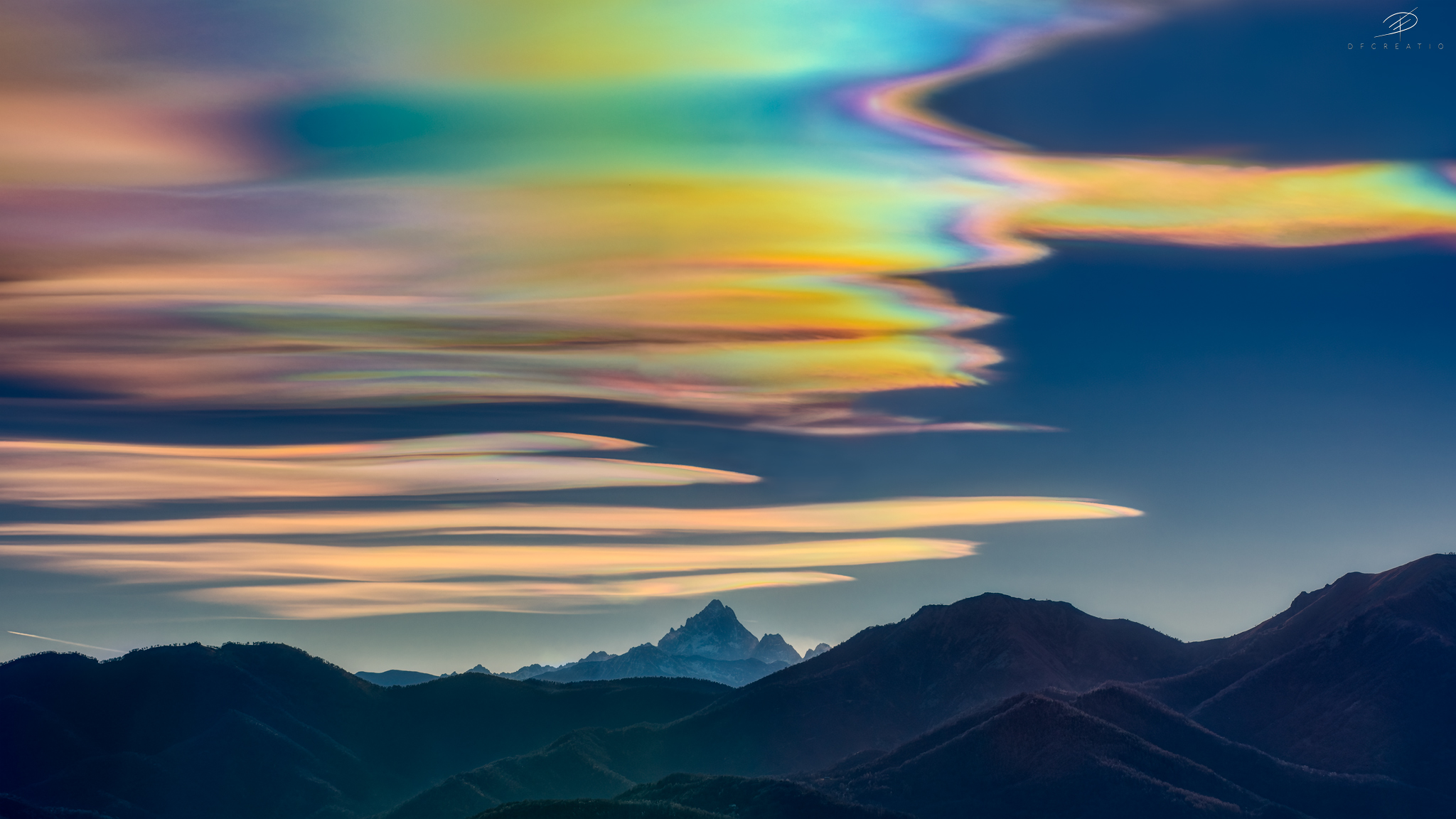 Iridescent clouds over Monviso...